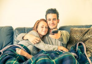 couple of lovers watching tv
