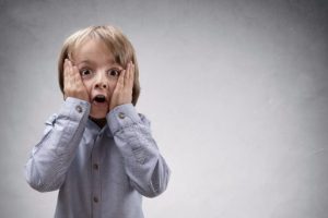 bigstock-shocked-and-surprised-boy-with-105925043-3-514x342