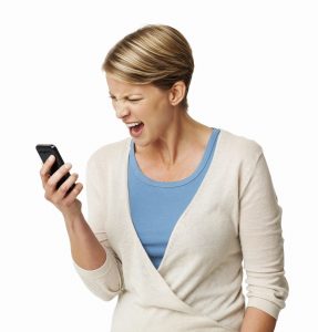 Frustrated Woman Screaming At Smart Phone