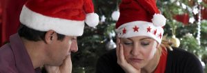 miserable couple having christmas dinner