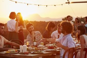 Friends communicating during social gathering