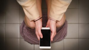 Using smartphone on toilet