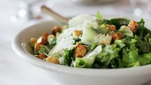 Caesar salad with croutons and parmesan cheese