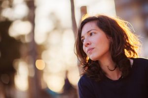 Beautiful woman looking away in a hope attitude