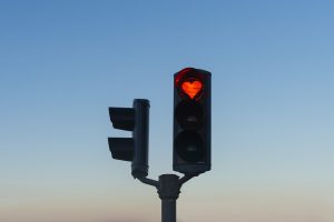 Heart-shaped red stop traffic light in Akureyri, Iceland
