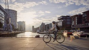 Young woman riding a bike