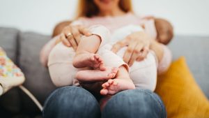 Mom is breastfeeding twins