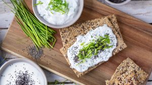 Crispbread, fresh curd, herbs and chia seeds