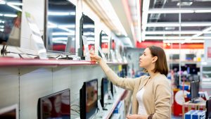 woman buys the TV