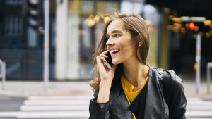 Laughing woman on the phone