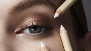 beauty close-up of a female face with make -up tools