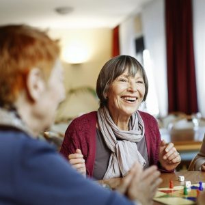 Senior Women Playing Board Game
