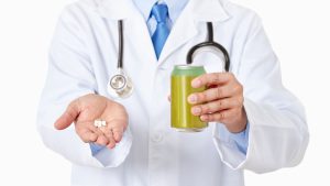doctor hands holding a soda drink can and saccharin