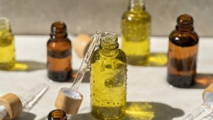 The concept of eco cosmetics packaging. Natural organic skin care for face. Beauty routine. Beautiful splashes in the sun.