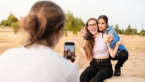 Three friends taking photos and selfies, three friends enjoying, living life