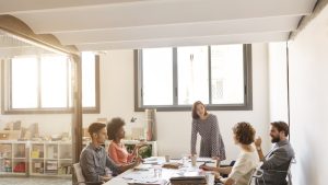 Business people discussing in board room