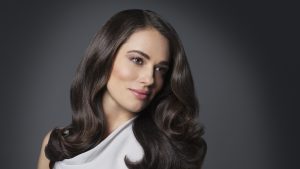 Portrait of beautiful woman with long brunette hair