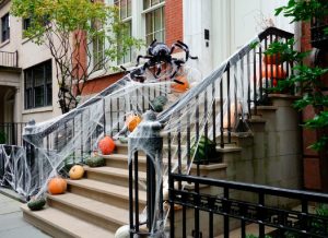Brownstone stoop decorated during Halloween