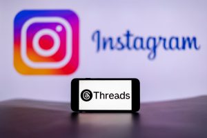 In this photo illustration, the Threads logo is seen