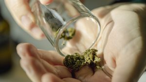 Close up of senior woman using cannabis at home