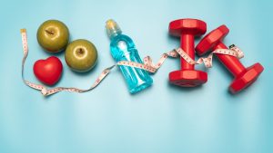 Fitness equipment. Healthy food. water,apple