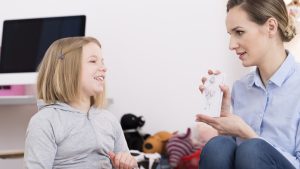 Discussing drawing during play therapy