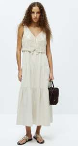 Vestido blanco con chaleco de El corte Inglés